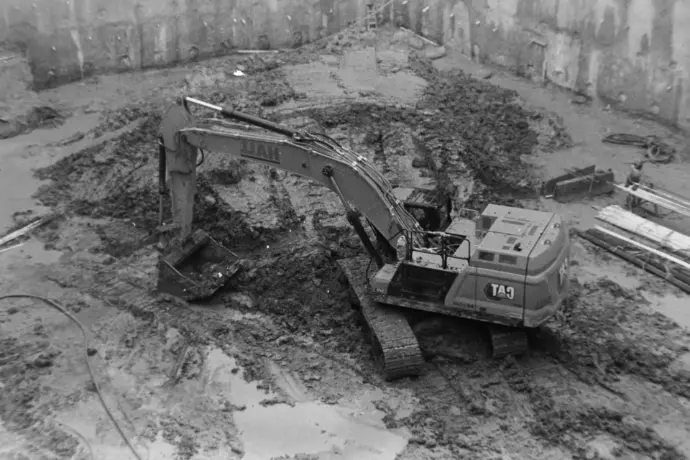an old black and white photo of a construction site